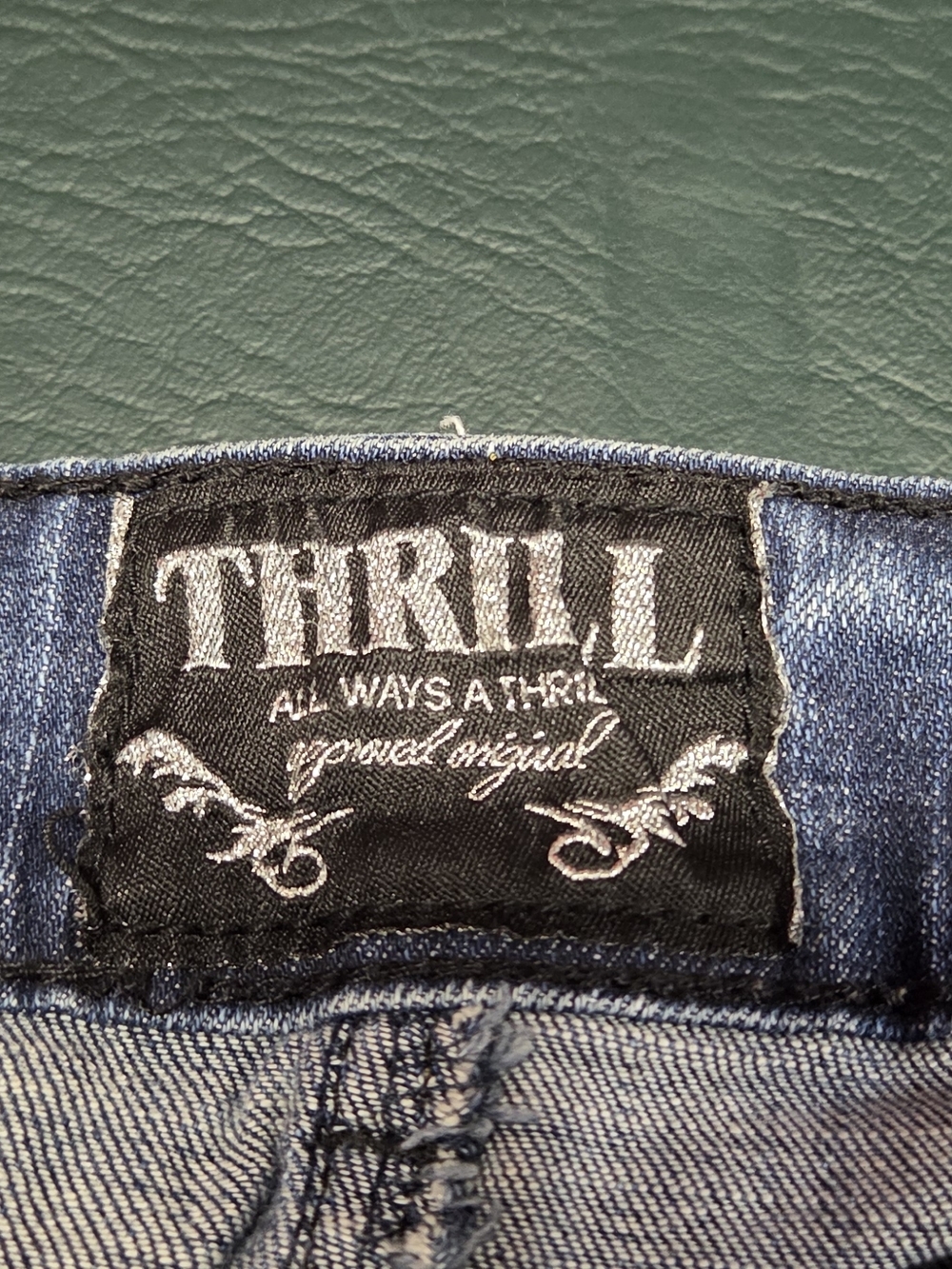 **Women’s Skinny Distressed Blue Jeans with Burgundy Patch Details** - Picture 9 of 11